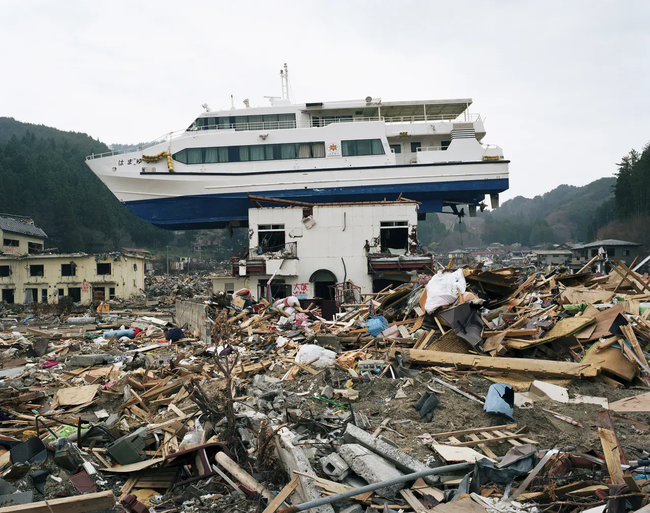 Boat dragged inland in Akahama, Japan by the 2011 tsunami (Credit: Stephen Vaughan)