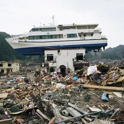 Boat dragged inland in Akahama, Japan by the 2011 tsunami