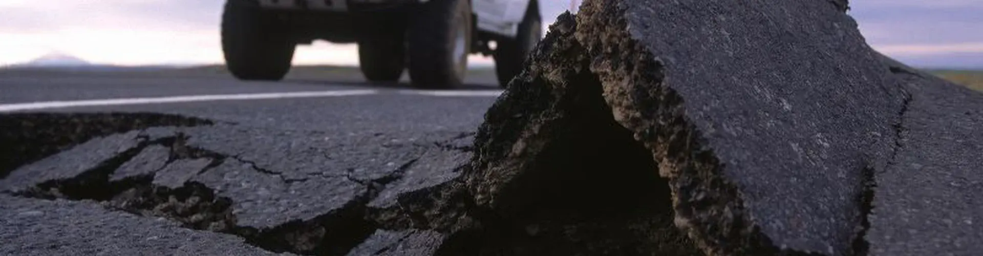 Earthquakes can cause damage anywhere they happen. This photo shows a road damaged by a tremor in Iceland. (Credit: Ragnar Sigurdsson/arctic-images.com, distributed via imaggeo.egu.eu)