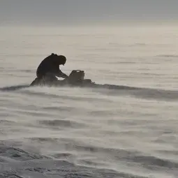 Study leader operating a radar on Pine Island Glacier