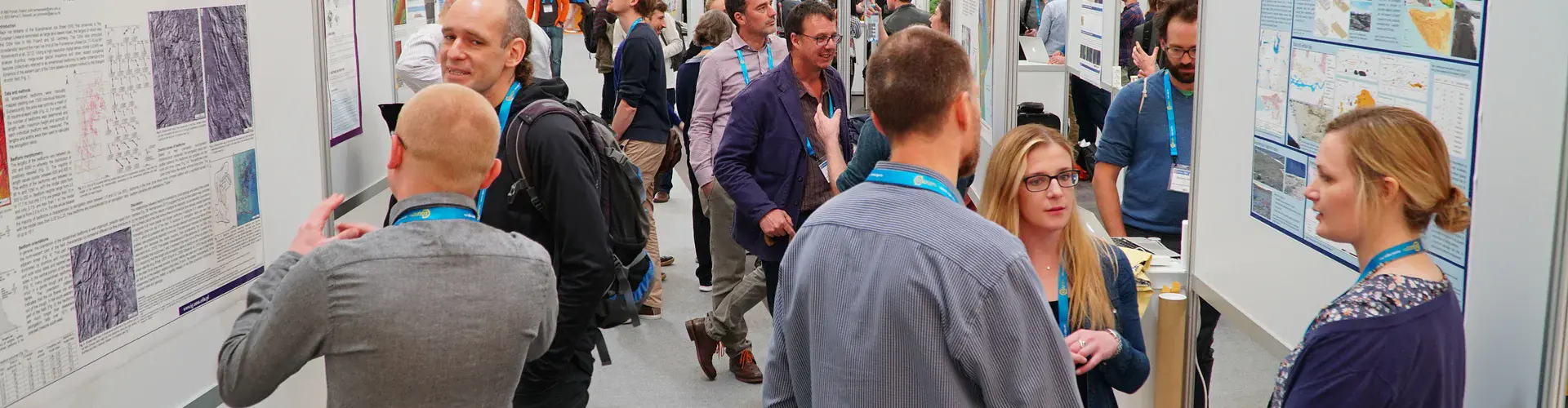 Participants discussing science during one of the EGU 2017 General Assembly poster sessions (Credit: EGU/Foto Pfluegl)