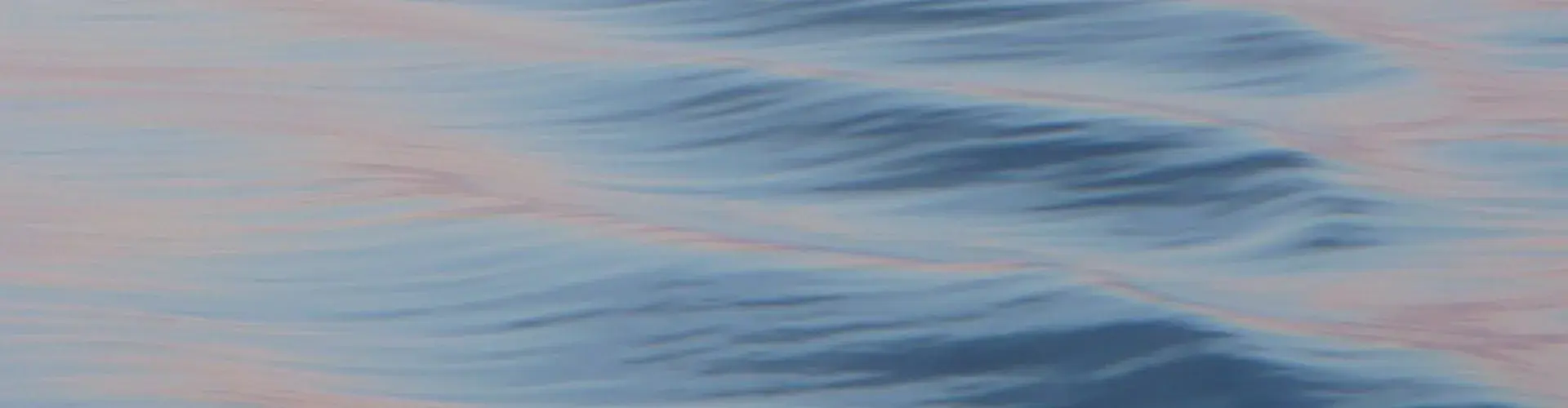 Bow waves at dusk on the Atlantic Ocean near the Norwegian coast (Credit: Gerrit de Rooij, distributed via imaggeo.egu.eu)