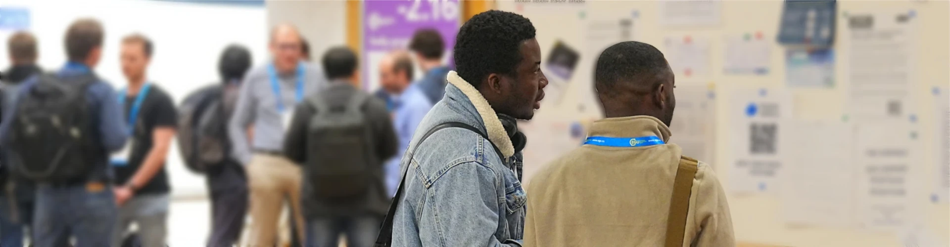 mentoring two men talking at board blur background.jpg