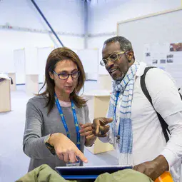 Poster Session - discussing