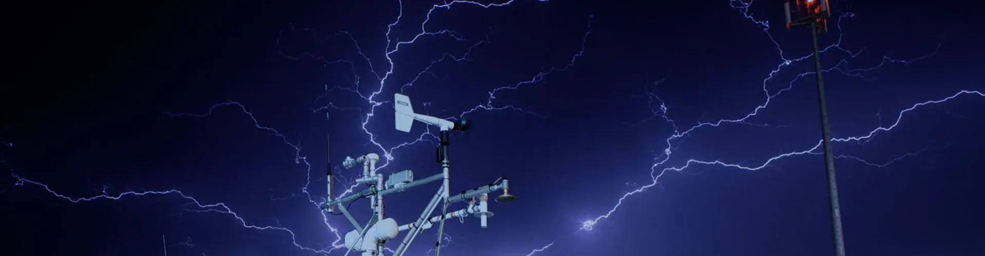 Lightning strike with a stormchase vehicle used in VORTEX2 in the foreground (Credit: Jonathan Gourley, distributed via imaggeo.egu.eu)