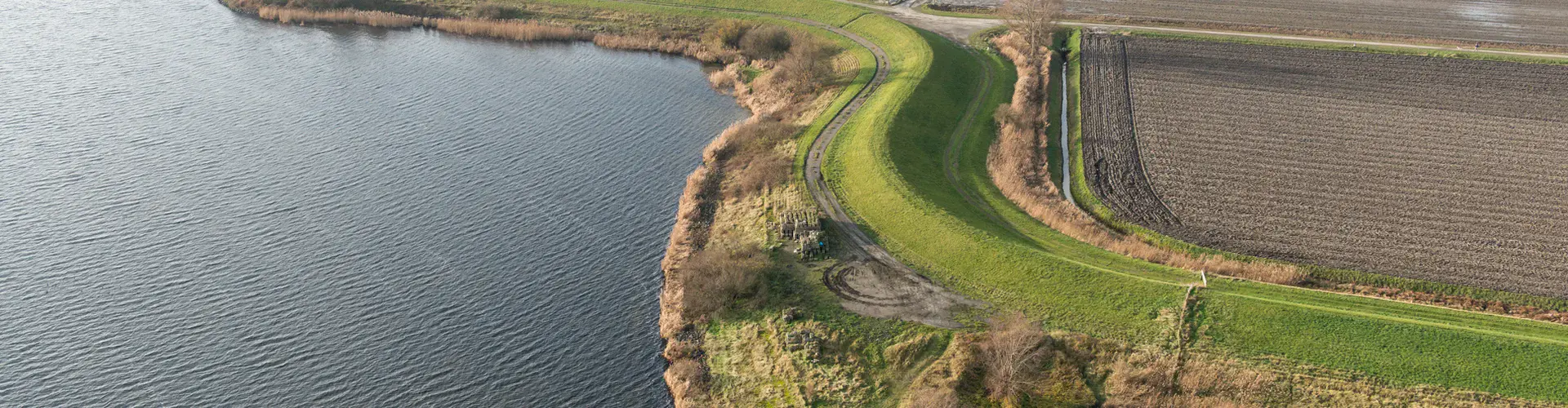 Aerial view of a seawall in the Netherlands protecting farmland that is below sea level. (Credit: Rijkswaterstaat, Ministry of Infrastructure and the Environment, the Netherlands)