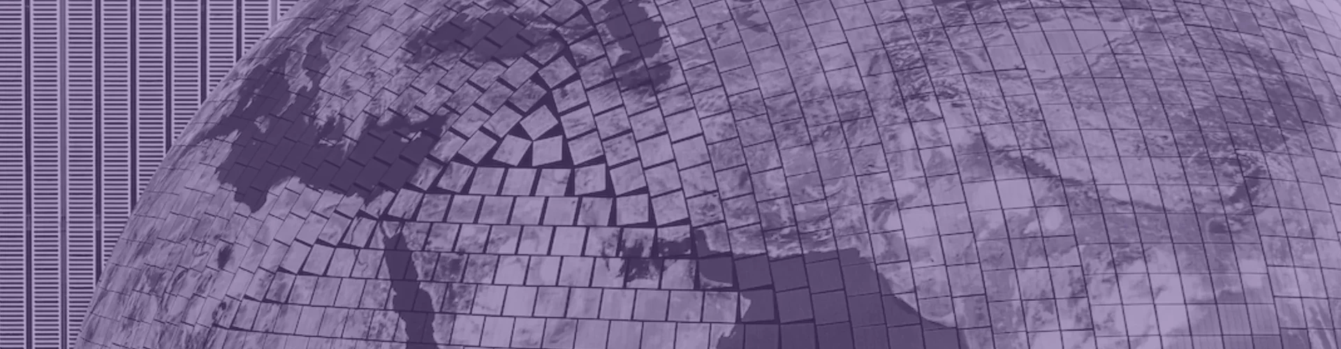 Tinted detail of a photo: Close-up of a huge globe made of many small screen tiles showing the Earth in colour, beside a walkway of visitors against a striped wall rendered in black and white.