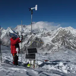 Taking measurements on Mera glacier in the Dudh Koshi basin (Everest visible in the background)